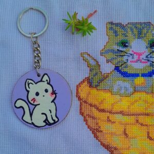 The Whisker Charm: Hand-Painted Artisan Cat Keychain in Lilac Mist