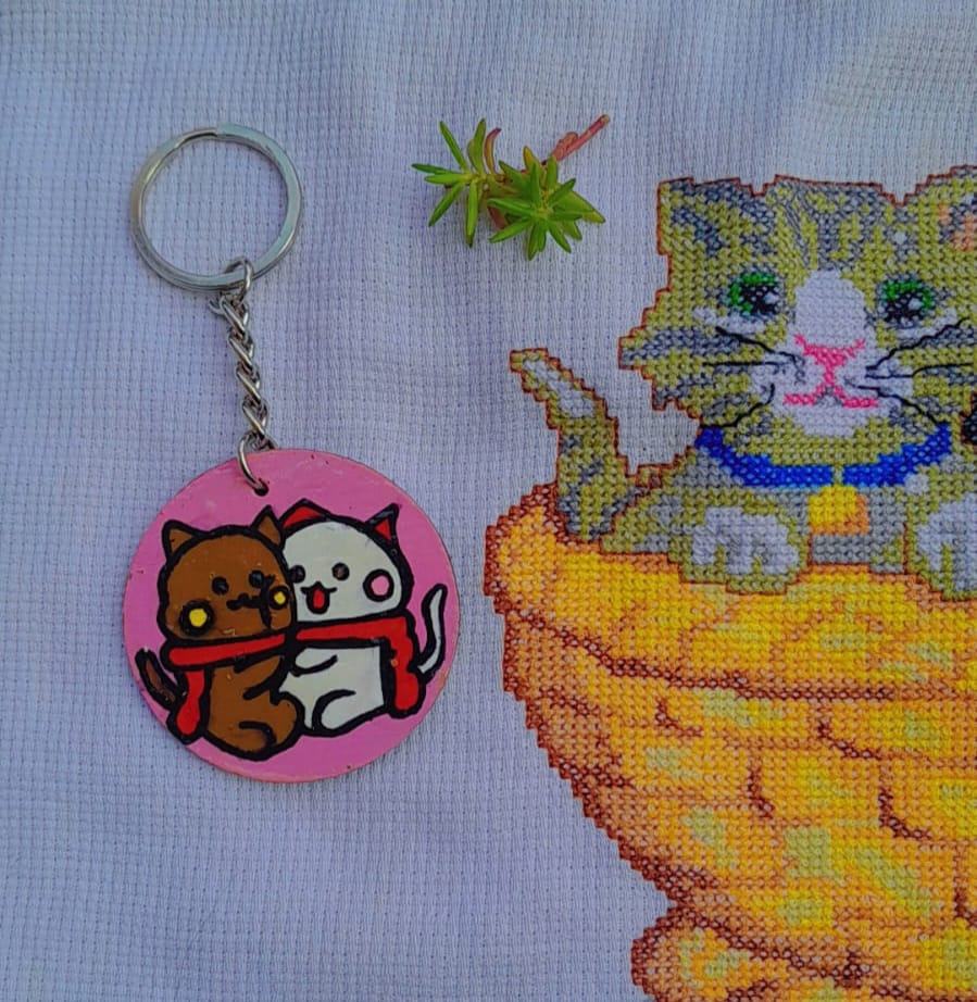 The "Cuddle-Core" Hand-Painted Circular Cat Keychain